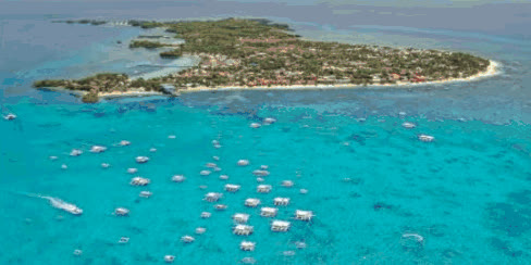 Aerial view of Malapascua Island with boats moored in turquoise water