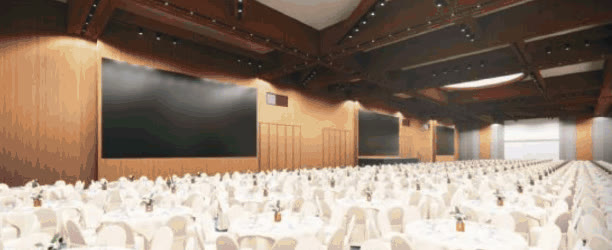 Render of the Mactan Expo Center Main Convention Hall in banquet setup with LED screens