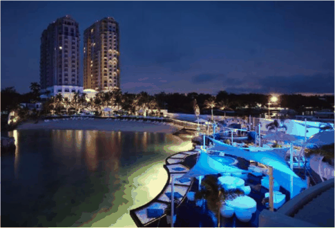 Mövenpick Hotel Mactan Island Cebu at night: the two towers and the Ibiza Beach Club