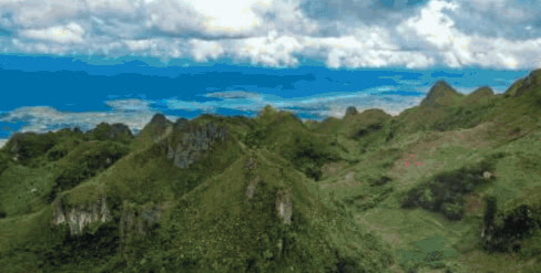 Jagged green hills of Osmeña Peak in Dalaguete