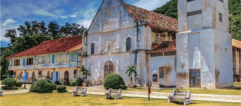 Patrocinio de Maria Church, its bell tower and the old convent in Boljoon