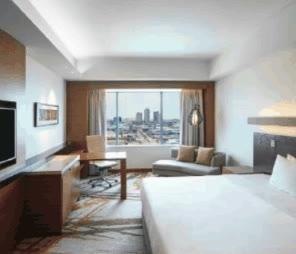 Radisson Blu Hotel Cebu guest room with city-view window