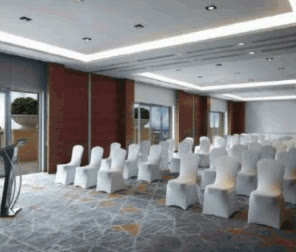 Radisson Blu Hotel Cebu meeting room with white chairs in theater setup